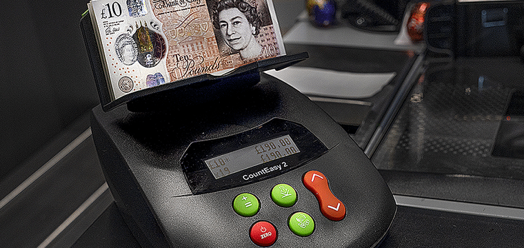 How automated cash handling systems work Automated cash handling devices